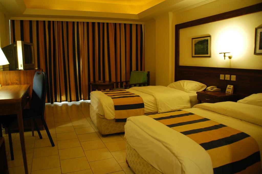 Mina Hotel Áqaba Habitación foto